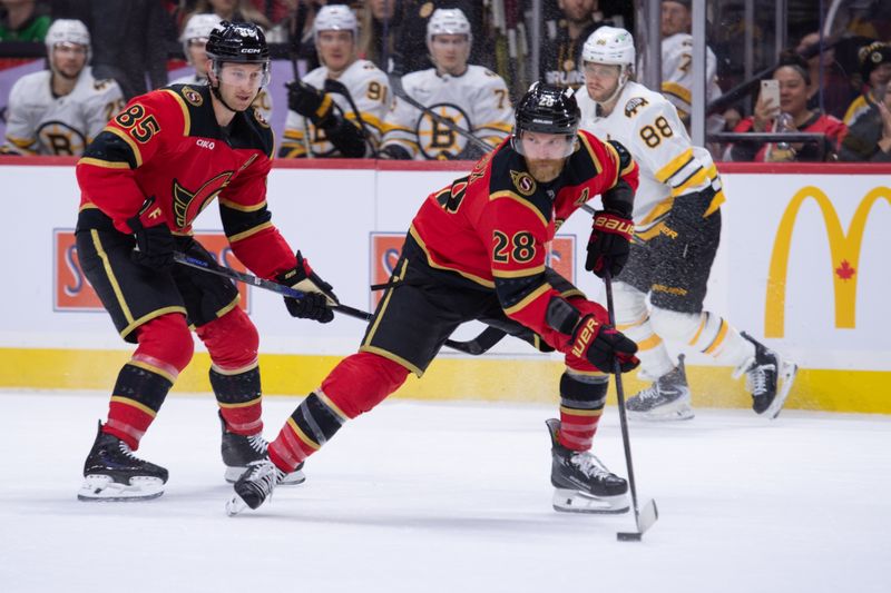 Oct 27, 2025; Ottawa, Ontario, CAN; Ottawa Senators right wing Claude Giroux (28) controls the puck in the first period against the Boston Bruins at the Canadian Tire Centre. Mandatory Credit: Marc DesRosiers-IMAGN Images