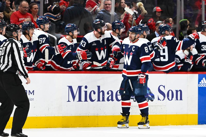 Dec 30, 2023; Washington, District of Columbia, USA; Washington Capitals left wing Alex Ovechkin (8) is congratulated by teammates after scoring a goal against the Nashville Predators during the second period at Capital One Arena. Mandatory Credit: Brad Mills-USA TODAY Sports