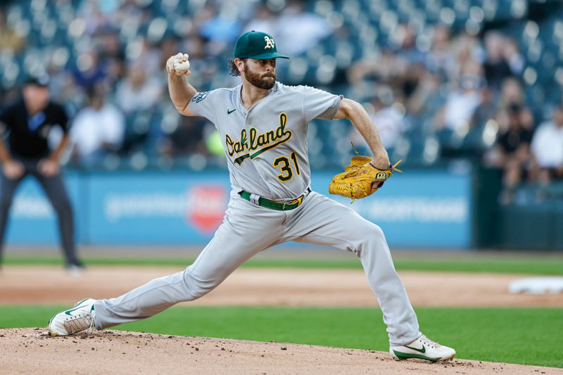 Aug 25, 2023; Chicago, Illinois, USA; Oakland Athletics starting pitcher Zach Neal (31) delivers a pitch against the Chicago White Sox during the first inning at Guaranteed Rate Field. Mandatory Credit: Kamil Krzaczynski-USA TODAY Sports