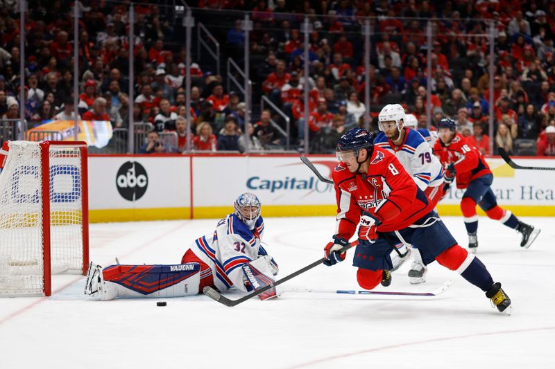 Jan 4, 2025; Washington, District of Columbia, USA; Washington Capitals left wing Alex Ovechkin (8) scores a goal on New York Rangers goaltender Jonathan Quick (32) in the third period at Capital One Arena. Mandatory Credit: Geoff Burke-Imagn Images