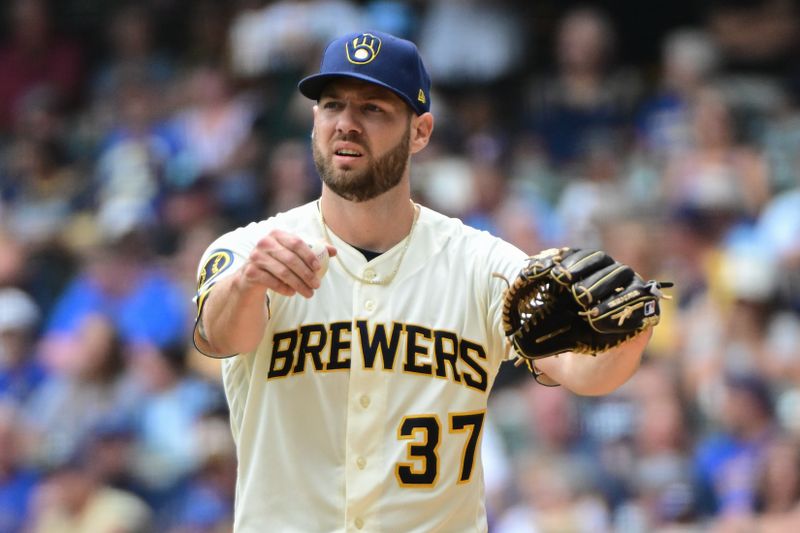 Aug 9, 2023; Milwaukee, Wisconsin, USA; Milwaukee Brewers pitcher Adrian Houser (37) gestures in the fourth inning against the Colorado Rockies at American Family Field. Mandatory Credit: Benny Sieu-USA TODAY Sports