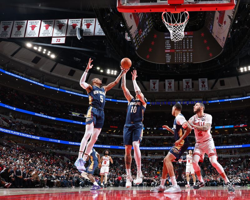 CHICAGO, IL - JANUARY 14: Dejounte Murray #5 of the New Orleans Pelicans rebounds during the game against the Chicago Bulls on January 14, 2025 at United Center in Chicago, Illinois. NOTE TO USER: User expressly acknowledges and agrees that, by downloading and or using this photograph, User is consenting to the terms and conditions of the Getty Images License Agreement. Mandatory Copyright Notice: Copyright 2025 NBAE (Photo by Jeff Haynes/NBAE via Getty Images)