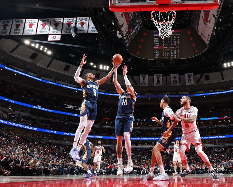 CHICAGO, IL - JANUARY 14: Dejounte Murray #5 of the New Orleans Pelicans rebounds during the game against the Chicago Bulls on January 14, 2025 at United Center in Chicago, Illinois. NOTE TO USER: User expressly acknowledges and agrees that, by downloading and or using this photograph, User is consenting to the terms and conditions of the Getty Images License Agreement. Mandatory Copyright Notice: Copyright 2025 NBAE (Photo by Jeff Haynes/NBAE via Getty Images)