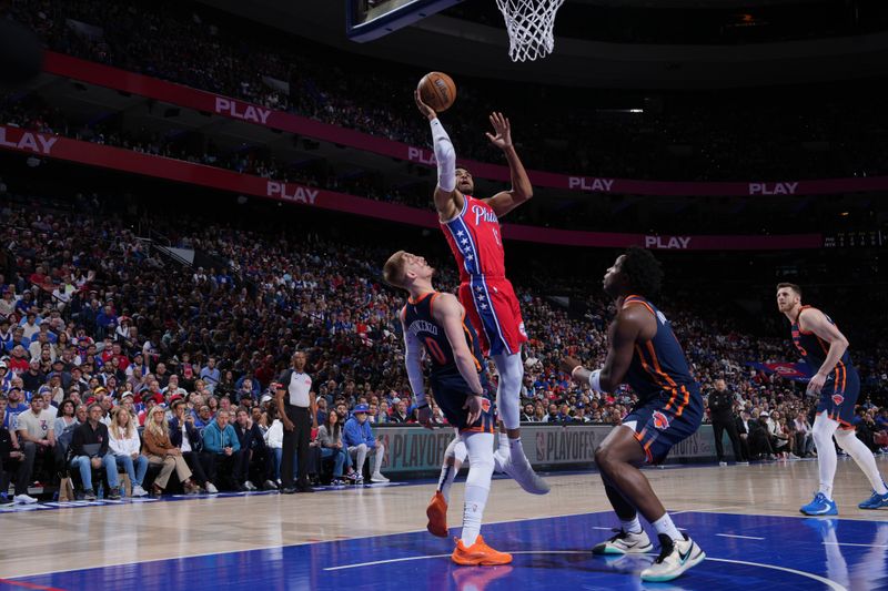 PHILADELPHIA, PA - APRIL 28: Tobias Harris #12 of the Philadelphia 76ers drives to the basket during the game against the New York Knicks during Round 1 Game 4 of the 2024 NBA Playoffs on April 28, 2024 at the Wells Fargo Center in Philadelphia, Pennsylvania NOTE TO USER: User expressly acknowledges and agrees that, by downloading and/or using this Photograph, user is consenting to the terms and conditions of the Getty Images License Agreement. Mandatory Copyright Notice: Copyright 2024 NBAE (Photo by Jesse D. Garrabrant/NBAE via Getty Images)