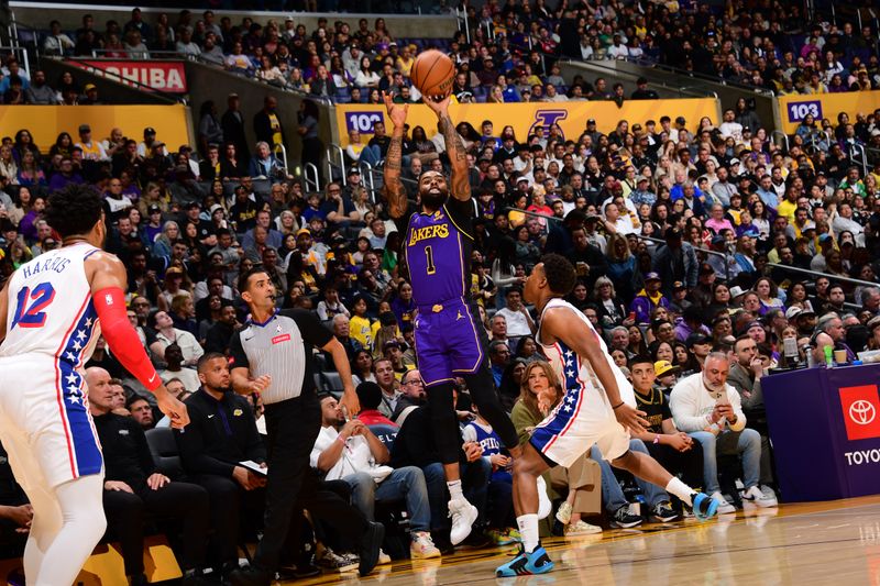 LOS ANGELES, CA - MARCH 22: D'Angelo Russell #1 of the Los Angeles Lakers shoots the ball during the game against the Philadelphia 76ers on March 22, 2024 at Crypto.Com Arena in Los Angeles, California. NOTE TO USER: User expressly acknowledges and agrees that, by downloading and/or using this Photograph, user is consenting to the terms and conditions of the Getty Images License Agreement. Mandatory Copyright Notice: Copyright 2024 NBAE (Photo by Adam Pantozzi/NBAE via Getty Images)