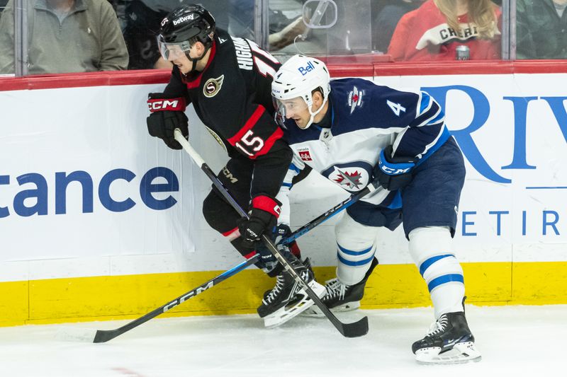 Feb 26, 2025; Ottawa, Ontario, CAN; Ottawa Senators center Matthew Highmore (15) battles with Winnipeg Jets defenseman Neal Pionk (4) in the third period at the Canadian Tire Centre. Mandatory Credit: Marc DesRosiers-Imagn Images