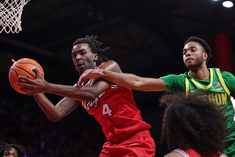 Jan 5, 2026; Piscataway, New Jersey, USA; Rutgers Scarlet Knights forward Bryce Dortch (4) rebounds against the Oregon Ducks during the first half at Jersey Mike's Arena. Mandatory Credit: Vincent Carchietta-Imagn Images