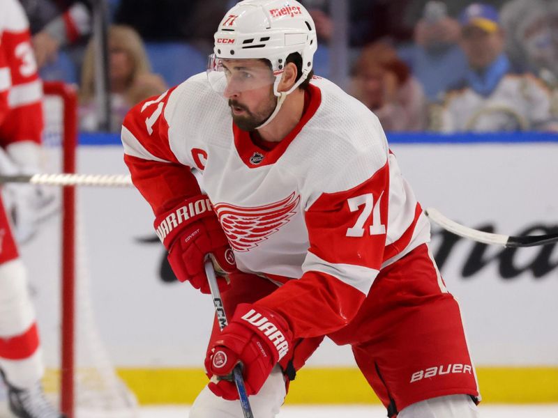 Dec 5, 2023; Buffalo, New York, USA;  Detroit Red Wings center Dylan Larkin (71) looks to make a pass during the third period against the Buffalo Sabres at KeyBank Center. Mandatory Credit: Timothy T. Ludwig-USA TODAY Sports