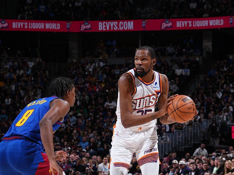 DENVER, CO - MARCH 5: Kevin Durant #35 of the Phoenix Suns looks to pass the ball during the game against the Denver Nuggets on March 5, 2024 at the Ball Arena in Denver, Colorado. NOTE TO USER: User expressly acknowledges and agrees that, by downloading and/or using this Photograph, user is consenting to the terms and conditions of the Getty Images License Agreement. Mandatory Copyright Notice: Copyright 2024 NBAE (Photo by Garrett Ellwood/NBAE via Getty Images)