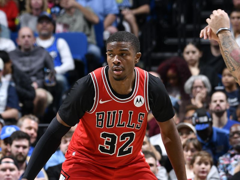 ORLANDO, FL - NOVEMBER 27: EJ Liddell #32 of the Chicago Bulls plays defense during the game against the Orlando Magic on November 27, 2024 at Kia Center in Orlando, Florida. NOTE TO USER: User expressly acknowledges and agrees that, by downloading and or using this photograph, User is consenting to the terms and conditions of the Getty Images License Agreement. Mandatory Copyright Notice: Copyright 2024 NBAE (Photo by Fernando Medina/NBAE via Getty Images)