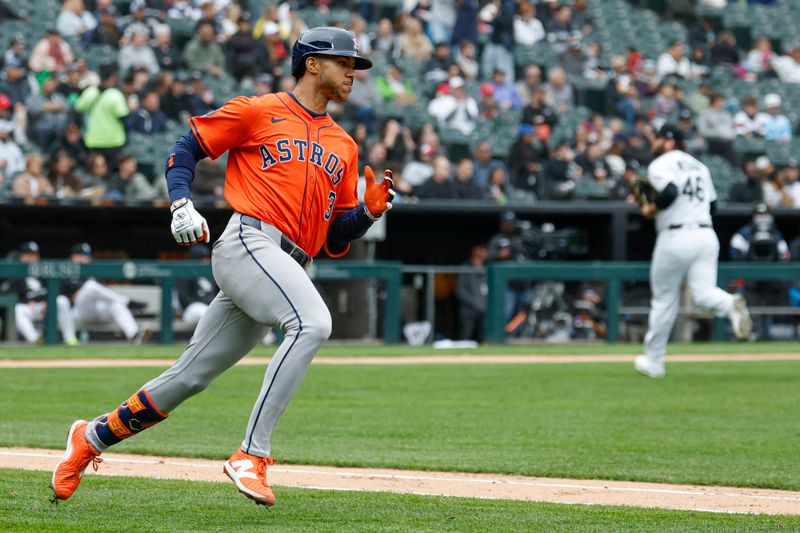 May 4, 2025; Chicago, Illinois, USA; Houston Astros shortstop Jeremy Pena (3) runs after hitting a single against the Chicago White Sox during the fourth inning at Rate Field. Mandatory Credit: Kamil Krzaczynski-Imagn Images