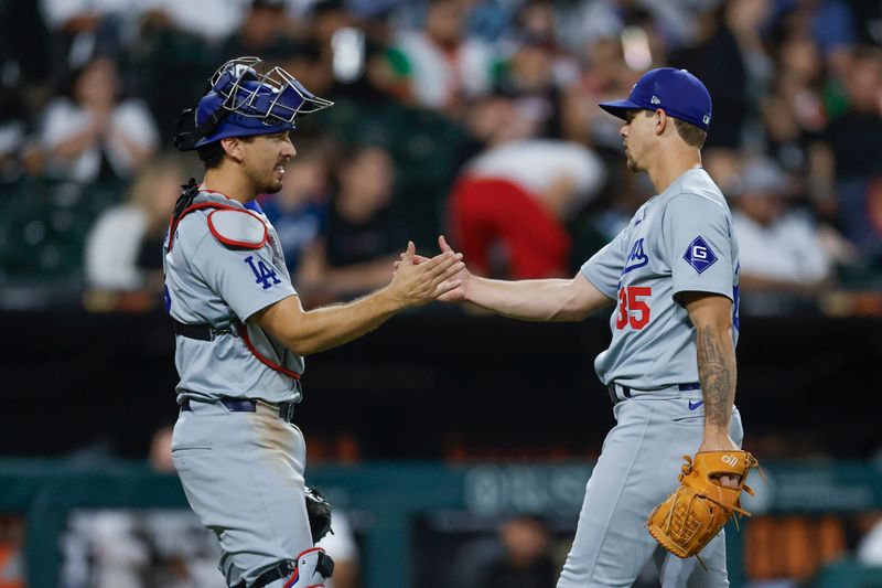 Jun 26, 2024; Chicago, Illinois, USA; Los Angeles Dodgers starting pitcher Gavin Stone (R) celebrates with catcher Austin Barnes (R) after defeating the Chicago White Sox at Guaranteed Rate Field. Mandatory Credit: Kamil Krzaczynski-USA TODAY Sports