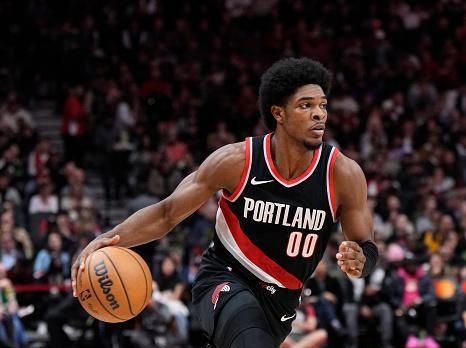 TORONTO, ON - OCTOBER 30: Scoot Henderson #00 of the Portland Trail Blazers dribbles against the Toronto Raptors during the first half of their basketball game at the Scotiabank Arena on October 30, 2023 in Toronto, Ontario, Canada. NOTE TO USER: User expressly acknowledges and agrees that, by downloading and/or using this Photograph, user is consenting to the terms and conditions of the Getty Images License Agreement. (Photo by Mark Blinch/Getty Images)