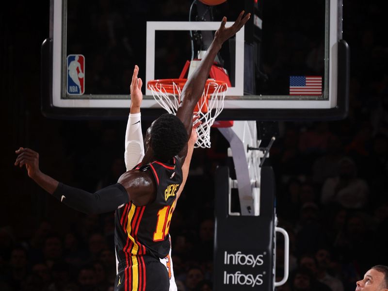 NEW YORK, NY - FEBRUARY 12: Mouhamed Gueye #18 of the Atlanta Hawks goes for a jump-ball during the game against the New York Knicks on February 12, 2025 at Madison Square Garden in New York City, New York.  NOTE TO USER: User expressly acknowledges and agrees that, by downloading and or using this photograph, User is consenting to the terms and conditions of the Getty Images License Agreement. Mandatory Copyright Notice: Copyright 2025 NBAE(Photo by Nathaniel S. Butler/NBAE via Getty Images)