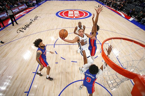 DETROIT, MI - DECEMBER 6: Desmond Bane #22 of the Memphis Grizzlies shoots the ball during the game against the Detroit Pistons on December 6, 2023 at Little Caesars Arena in Detroit, Michigan. NOTE TO USER: User expressly acknowledges and agrees that, by downloading and/or using this photograph, User is consenting to the terms and conditions of the Getty Images License Agreement. Mandatory Copyright Notice: Copyright 2023 NBAE (Photo by Brian Sevald/NBAE via Getty Images)