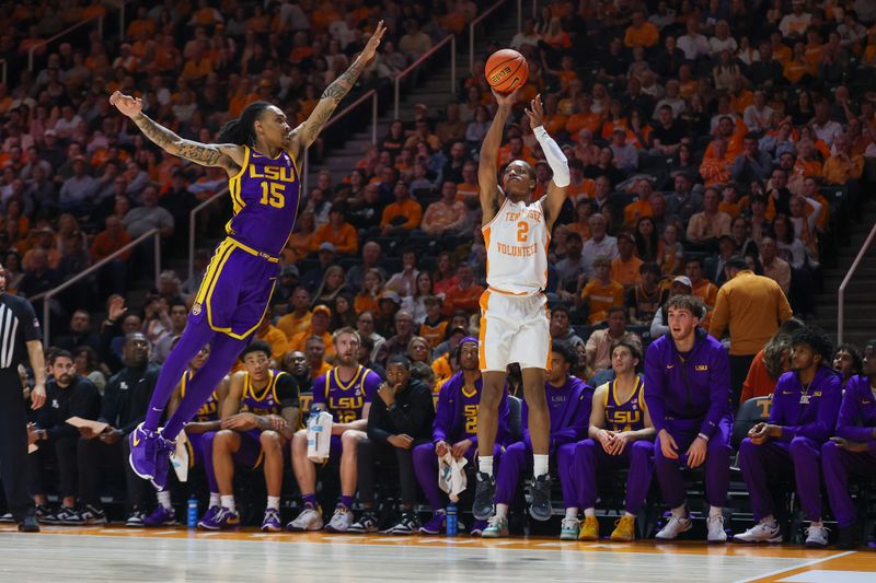 Feb 7, 2024; Knoxville, Tennessee, USA; Tennessee Volunteers guard Jordan Gainey (2) shoots a three pointer against LSU Tigers forward Tyrell Ward (15) during the first half at Thompson-Boling Arena at Food City Center. Mandatory Credit: Randy Sartin-USA TODAY Sports