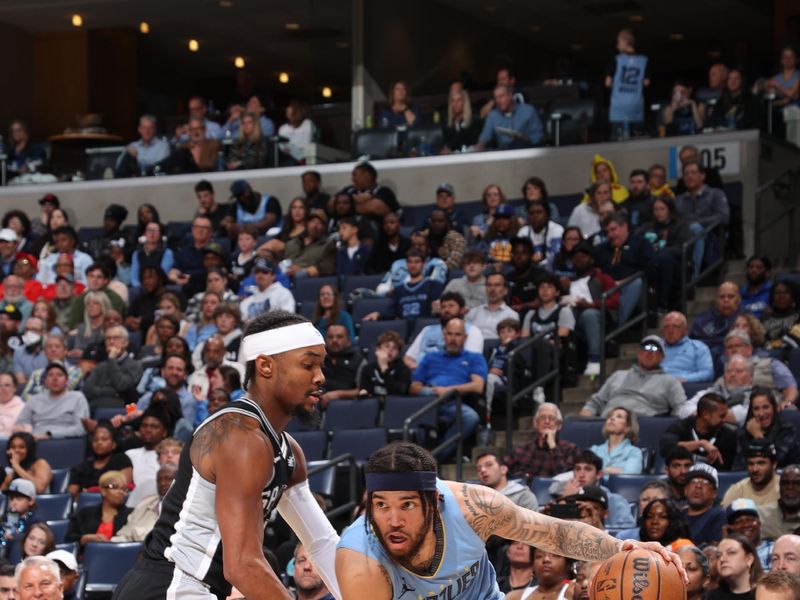 MEMPHIS, TN - APRIL 9: Timmy Allen #0 of the Memphis Grizzlies drives to the basket during the game against the San Antonio Spurs on April 9, 2024 at FedExForum in Memphis, Tennessee. NOTE TO USER: User expressly acknowledges and agrees that, by downloading and or using this photograph, User is consenting to the terms and conditions of the Getty Images License Agreement. Mandatory Copyright Notice: Copyright 2024 NBAE (Photo by Joe Murphy/NBAE via Getty Images)