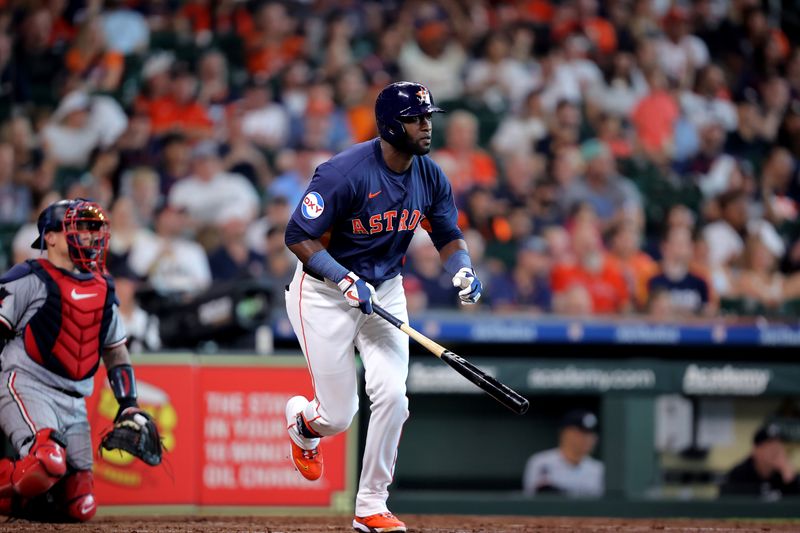 Jun 1, 2024; Houston, Texas, USA; Houston Astros designated hitter Yordan Alvarez (44) hits a home run against the Minnesota Twins during the fifth inning at Minute Maid Park. Mandatory Credit: Erik Williams-USA TODAY Sports