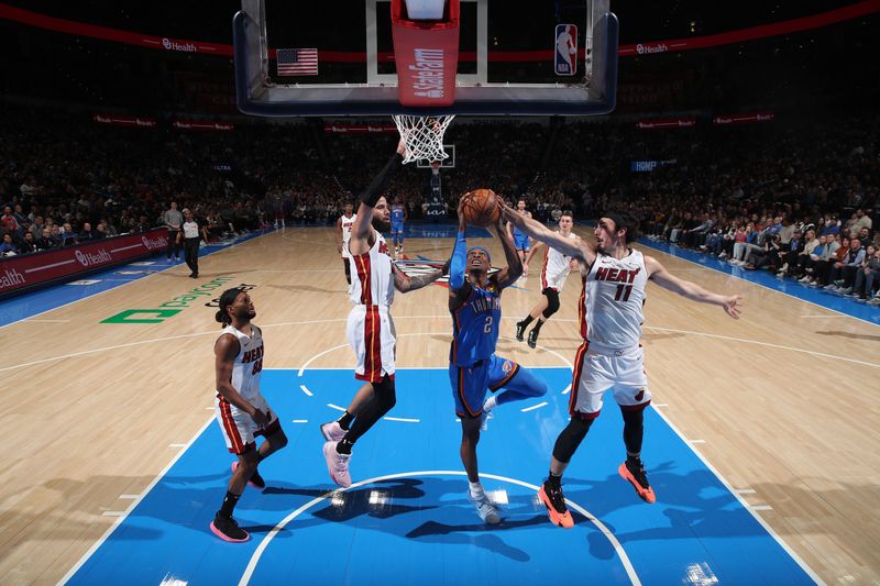 OKLAHOMA CITY, OK - MARCH 8:  Shai Gilgeous-Alexander #2 of the Oklahoma City Thunder drives to the basket during the game against the Miami Heat on March 8, 2024 at Paycom Arena in Oklahoma City, Oklahoma. NOTE TO USER: User expressly acknowledges and agrees that, by downloading and or using this photograph, User is consenting to the terms and conditions of the Getty Images License Agreement. Mandatory Copyright Notice: Copyright 2024 NBAE (Photo by Zach Beeker/NBAE via Getty Images)