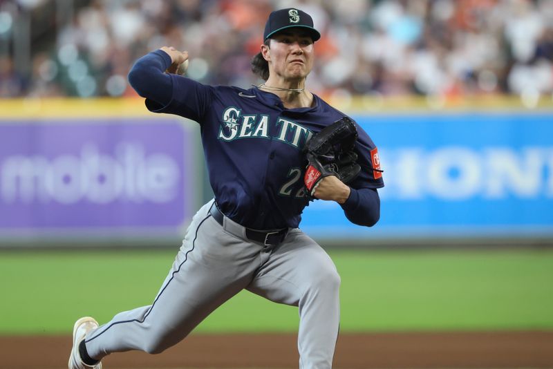May 24, 2025; Houston, Texas, USA; Seattle Mariners starting pitcher Bryan Woo (22) delivers a pitch during the fifth inning against the Houston Astros at Daikin Park. Mandatory Credit: Troy Taormina-Imagn Images