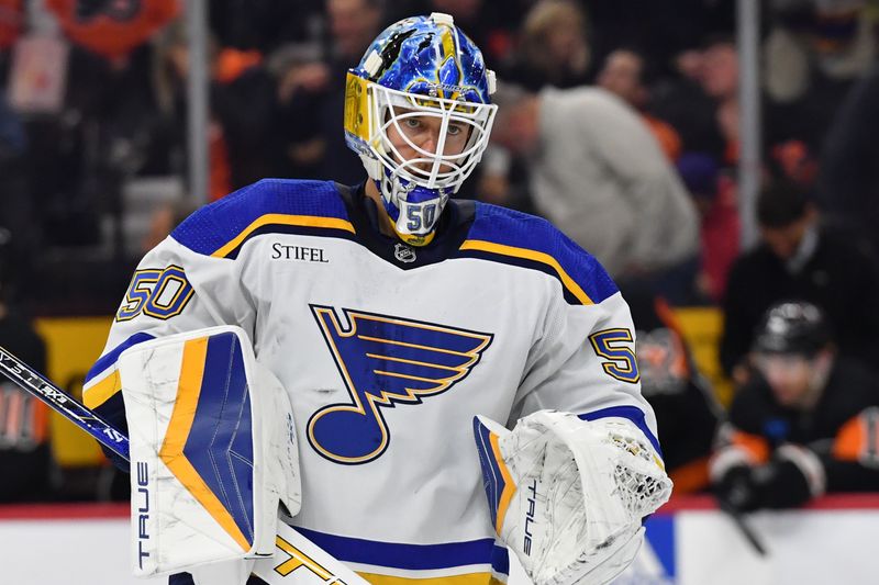 Mar 4, 2024; Philadelphia, Pennsylvania, USA; St. Louis Blues goaltender Jordan Binnington (50) against the Philadelphia Flyers during the second period at Wells Fargo Center. Mandatory Credit: Eric Hartline-USA TODAY Sports