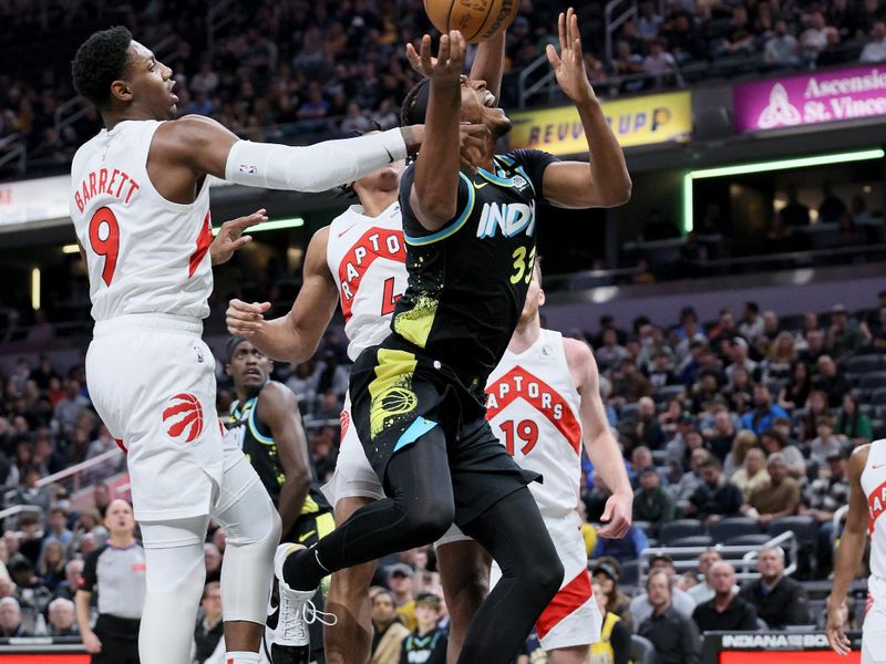 INDIANAPOLIS, INDIANA - FEBRUARY 26:   Myles Turner #33 of the Indiana Pacers shoots the ball while defended by RJ Barrett #9 of  the Toronto Raptors at Gainbridge Fieldhouse on February 26, 2024 in Indianapolis, Indiana.    NOTE TO USER: User expressly acknowledges and agrees that, by downloading and or using this photograph, User is consenting to the terms and conditions of the Getty Images License Agreement.  (Photo by Andy Lyons/Getty Images)