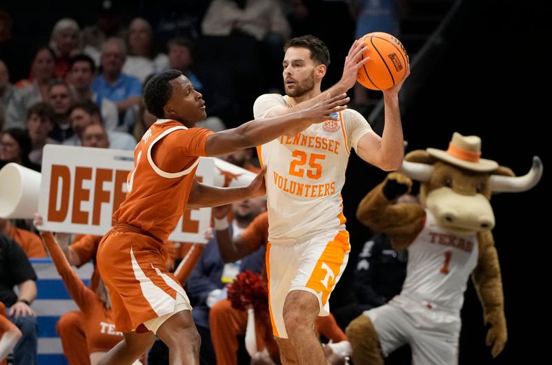 March 23, 2024, Charlotte, NC, USA; Tennessee Volunteers guard Santiago Vescovi (25) holds the ball away from Texas Longhorns guard Max Abmas (3) in the second round of the 2024 NCAA Tournament at the Spectrum Center. Mandatory Credit: Bob Donnan-USA TODAY Sports