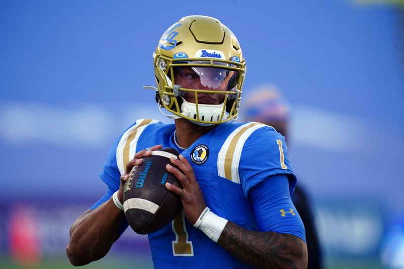 Dec 12, 2020; Pasadena, California, USA; UCLA Bruins quarterback Dorian Thompson-Robinson (1) throws the ball before the game against the Southern California Trojans at Rose Bowl. Mandatory Credit: Kirby Lee-USA TODAY Sports