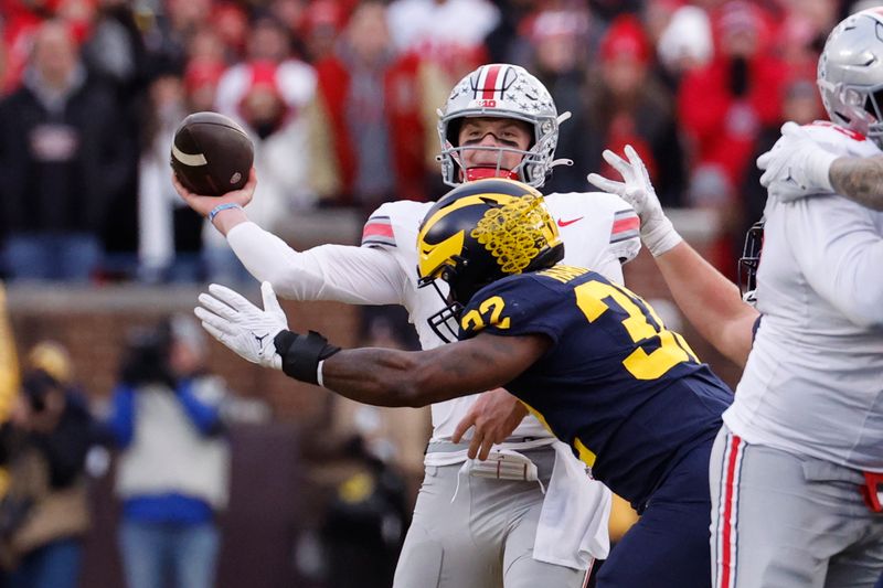 Nov 25, 2023; Ann Arbor, Michigan, USA; Ohio State Buckeyes quarterback Kyle McCord (6) passes in the second half against the Michigan Wolverines at Michigan Stadium. Mandatory Credit: Rick Osentoski-USA TODAY Sports