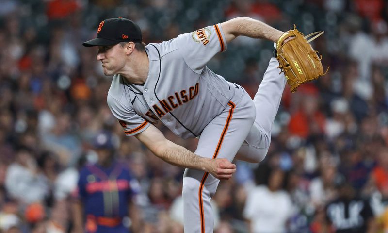 May 1, 2023; Houston, Texas, USA; San Francisco Giants starting pitcher Ross Stripling (48) delivers a pitch during the first inning against the Houston Astros at Minute Maid Park. Mandatory Credit: Troy Taormina-USA TODAY Sports