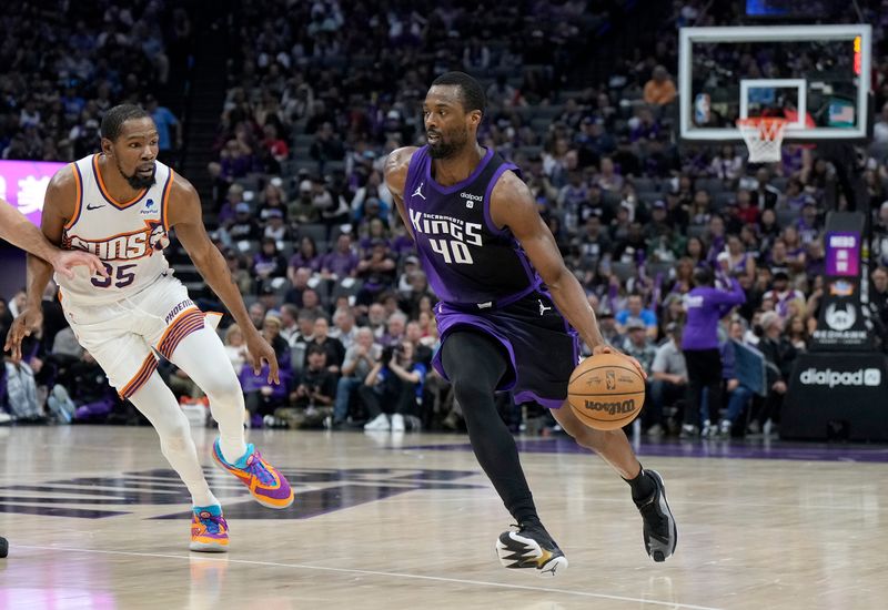 SACRAMENTO, CALIFORNIA - APRIL 12: Harrison Barnes<p><br/></p> dribbles the ball against the Phoenix Suns during the second half of an NBA basketball game at Golden 1 Center on April 12, 2024 in Sacramento, California. NOTE TO USER: User expressly acknowledges and agrees that, by downloading and or using this photograph, User is consenting to the terms and conditions of the Getty Images License Agreement. (Photo by Thearon W. Henderson/Getty Images)