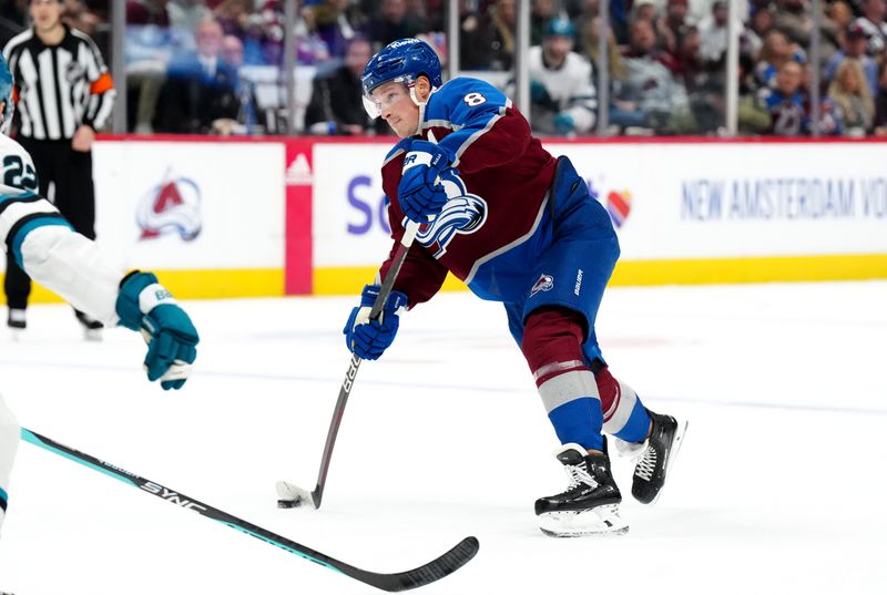 Dec 31, 2023; Denver, Colorado, USA; Colorado Avalanche defenseman Cale Makar (8) shoots the puck in the second period against the San Jose Sharks at Ball Arena. Mandatory Credit: Ron Chenoy-USA TODAY Sports