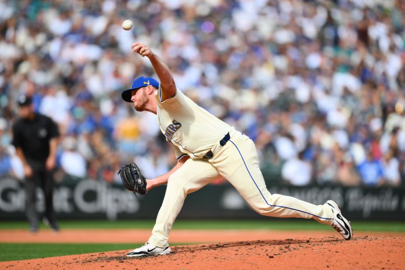 Sep 28, 2025; Seattle, Washington, USA; Seattle Mariners relief pitcher Caleb Ferguson (43) pitches to the Los Angeles Dodgers during the fifth inning at T-Mobile Park. Mandatory Credit: Steven Bisig-Imagn Images
