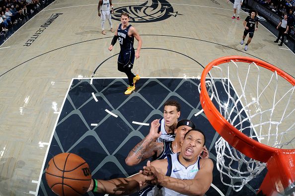 ORLANDO, FL - NOVEMBER 6: Grant Williams #3 of the Dallas Mavericks drives to the basket during the game against the Orlando Magic on November 6, 2023 at Amway Center in Orlando, Florida. NOTE TO USER: User expressly acknowledges and agrees that, by downloading and or using this photograph, User is consenting to the terms and conditions of the Getty Images License Agreement. Mandatory Copyright Notice: Copyright 2023 NBAE (Photo by Fernando Medina/NBAE via Getty Images)