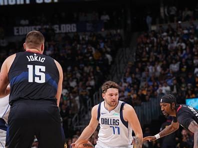 DENVER, CO - DECEMBER 18: Luka Doncic #77 of the Dallas Mavericks handles the ball during the game against the Denver Nuggets on December 18, 2023 at the Ball Arena in Denver, Colorado. NOTE TO USER: User expressly acknowledges and agrees that, by downloading and/or using this Photograph, user is consenting to the terms and conditions of the Getty Images License Agreement. Mandatory Copyright Notice: Copyright 2023 NBAE (Photo by Bart Young/NBAE via Getty Images)