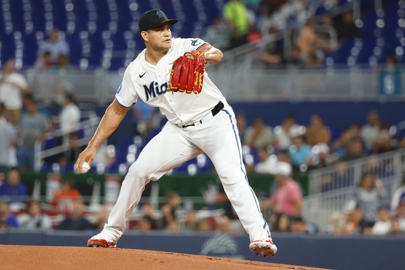 Jul 22, 2024; Miami, Florida, USA;  Miami Marlins starting pitcher Yonny Chirinos (26) pitches against the New York Mets in the first inning at loanDepot Park. Mandatory Credit: Rhona Wise-USA TODAY Sports