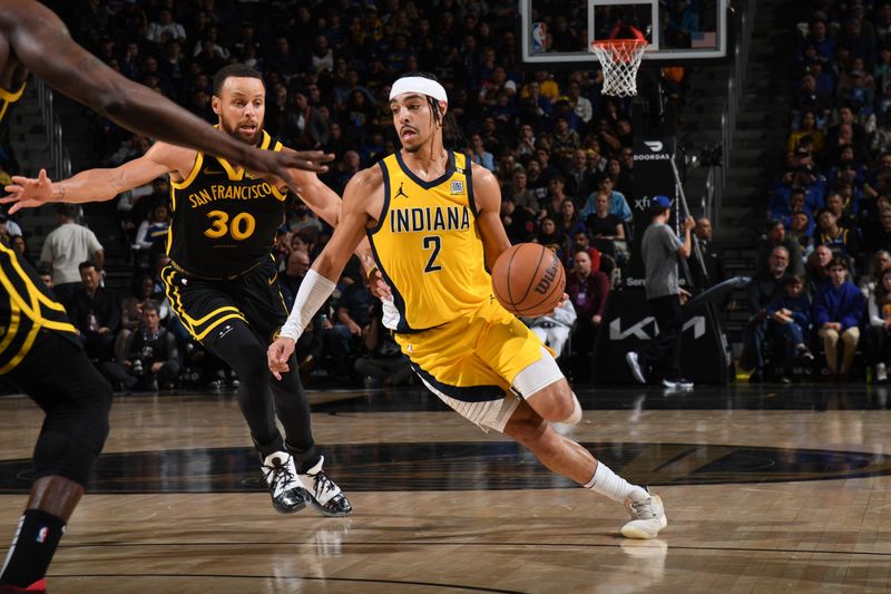 SAN FRANCISCO, CA - MARCH 22: Andrew Nembhard #2 of the Indiana Pacers dribbles the ball during the game against the Golden State Warriors on March 22, 2024 at Chase Center in San Francisco, California. NOTE TO USER: User expressly acknowledges and agrees that, by downloading and or using this photograph, user is consenting to the terms and conditions of Getty Images License Agreement. Mandatory Copyright Notice: Copyright 2024 NBAE (Photo by Noah Graham/NBAE via Getty Images)