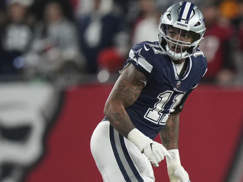 Dallas Cowboys linebacker Micah Parsons (11) drops back deep in secondary as he watches the passer during an NFL wild-card football game against the Tampa Bay Buccaneers, Monday, Jan. 16, 2023, in Tampa, Fla. (AP Photo/Peter Joneleit)