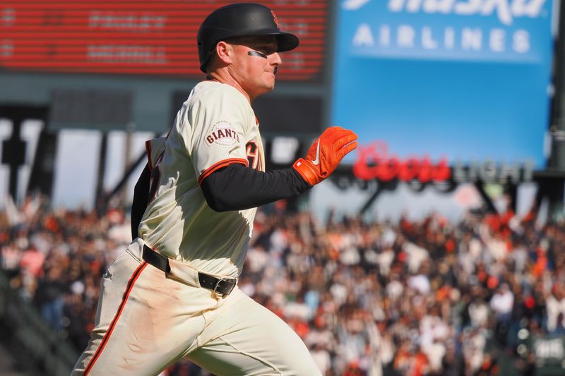 Apr 5, 2024; San Francisco, California, USA; San Francisco Giants third baseman Matt Chapman (26) scores a walk-off run against the San Diego Padres during the ninth inning at Oracle Park. Mandatory Credit: Kelley L Cox-USA TODAY Sports