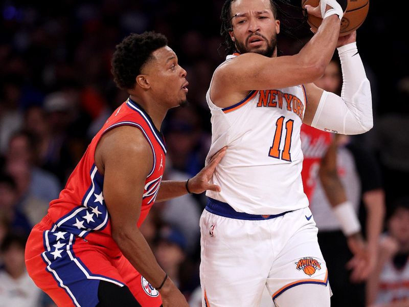 NEW YORK, NEW YORK - APRIL 20: Jalen Brunson #11 of the New York Knicks tries to keep the ball as Kyle Lowry #7 of the Philadelphia 76ers defends during the first half in game one of the Eastern Conference First Round Playoffs at Madison Square Garden on April 20, 2024 in New York City. NOTE TO USER: User expressly acknowledges and agrees that, by downloading and or using this photograph, User is consenting to the terms and conditions of the Getty Images License Agreement. (Photo by Elsa/Getty Images)