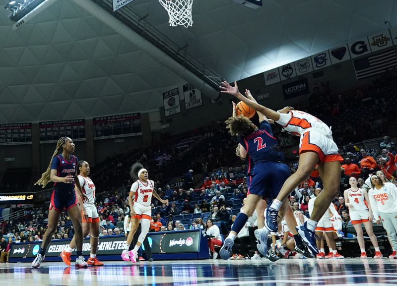 Mar 23, 2024; Storrs, Connecticut, USA; Arizona Wildcats guard Jada Williams (2) and guard Alaina Rice (25) work for the ball in the second half at Harry A. Gampel Pavilion. Mandatory Credit: David Butler II-USA TODAY Sports