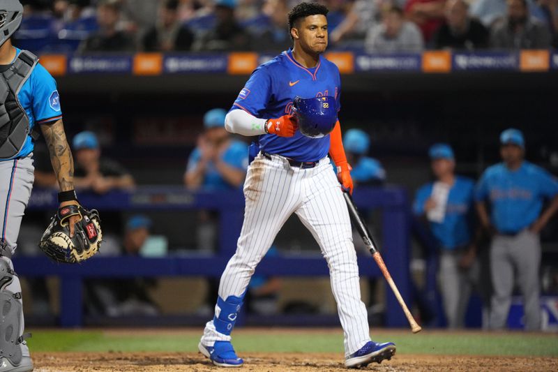 Mar 3, 2025; Port St. Lucie, Florida, USA;  New York Mets outfielder Juan Soto (22) walks back to the dugout after striking out in the fourth inning against the Miami Marlins at Clover Park. Mandatory Credit: Jim Rassol-Imagn Images