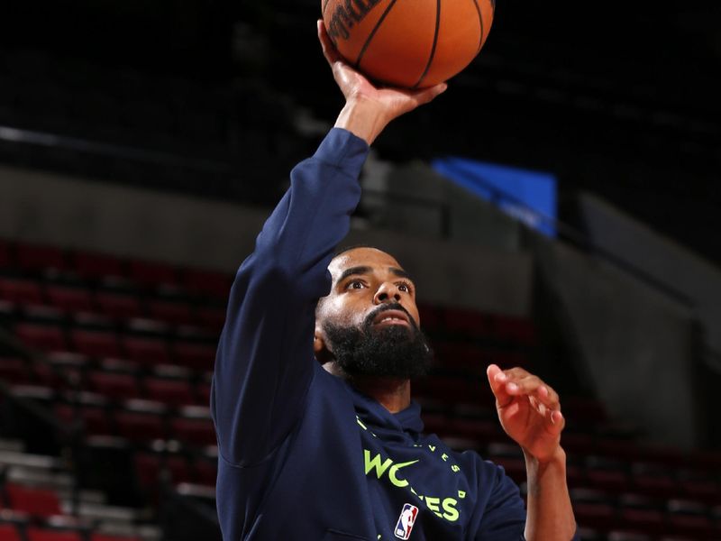 PORTLAND, OR - NOVEMBER 13: Mike Conley #10 of the Minnesota Timberwolves warms up before the game against the Portland Trail Blazers on November 13, 2024 at the Moda Center Arena in Portland, Oregon. NOTE TO USER: User expressly acknowledges and agrees that, by downloading and or using this photograph, user is consenting to the terms and conditions of the Getty Images License Agreement. Mandatory Copyright Notice: Copyright 2024 NBAE (Photo by Cameron Browne/NBAE via Getty Images)