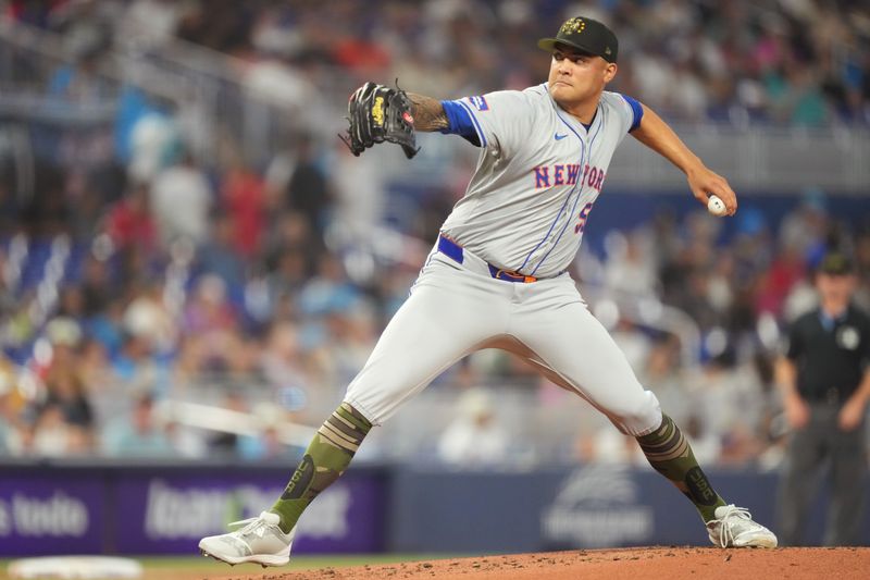 May 19, 2024; Miami, Florida, USA;  New York Mets pitcher Sean Manaea (59) pitches in the first inning against the Miami Marlins at loanDepot Park. Mandatory Credit: Jim Rassol-USA TODAY Sports