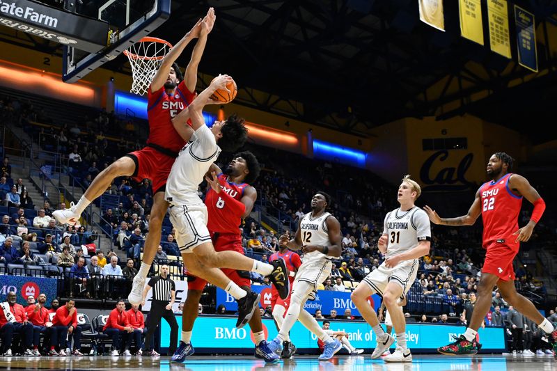 Feb 26, 2025; Berkeley, California, USA; SMU Mustangs forward Tibet Görener (5) fouls California Golden Bears guard Andrej Stojakovic (2) in the first half at Haas Pavilion. Mandatory Credit: Eakin Howard-Imagn Images