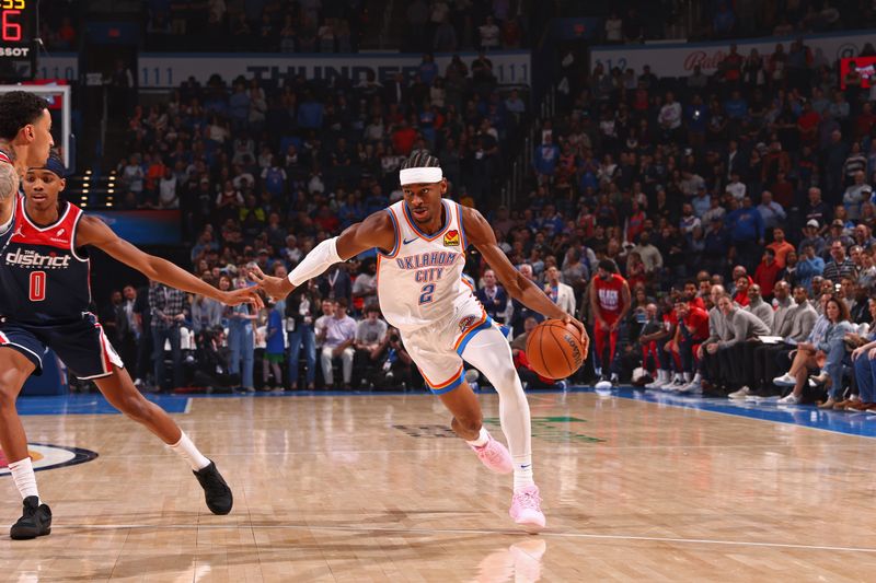 OKLAHOMA CITY, OK - FEBRUARY 23: Shai Gilgeous-Alexander #2 of the Oklahoma City Thunder handles the ball during the game against the Washington Wizards on February 23, 2024 at Paycom Arena in Oklahoma City, Oklahoma. NOTE TO USER: User expressly acknowledges and agrees that, by downloading and or using this photograph, User is consenting to the terms and conditions of the Getty Images License Agreement. Mandatory Copyright Notice: Copyright 2024 NBAE (Photo by Zach Beeker/NBAE via Getty Images)