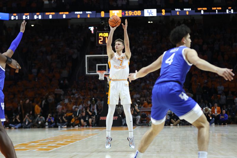 Jan 28, 2025; Knoxville, Tennessee, USA; Tennessee Volunteers forward Igor Milicic Jr. (7) shoots a three-point basket against the Kentucky Wildcats during the first half at Thompson-Boling Arena at Food City Center. Mandatory Credit: Randy Sartin-Imagn Images