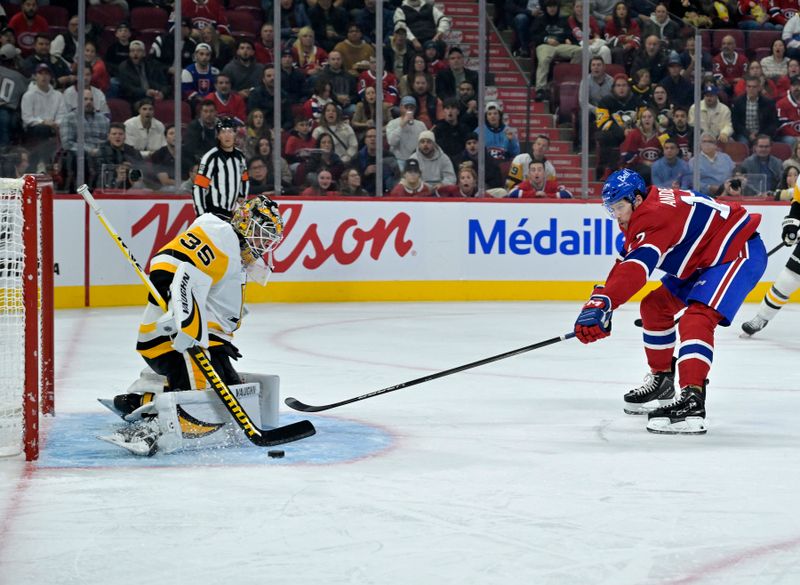 Oct 14, 2024; Montreal, Quebec, CAN; Pittsburgh Penguins goalie Tristan Jarry (35) stops Montreal Canadiens forward Josh Anderson (17) during the second period at the Bell Centre. Mandatory Credit: Eric Bolte-Imagn Images