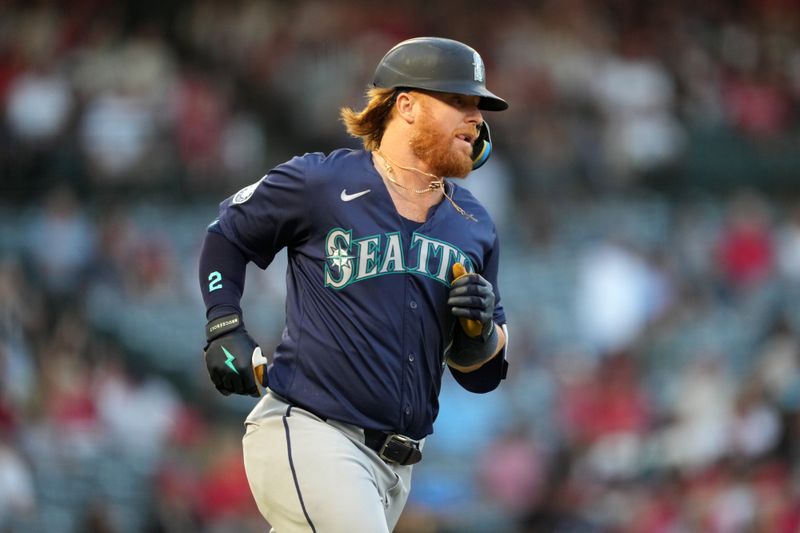 Aug 31, 2024; Anaheim, California, USA; Seattle Mariners first baseman Justin Turner (2) runs the bases after hitting a home run in the second inning against the Los Angeles Angels at Angel Stadium. Mandatory Credit: Kirby Lee-USA TODAY Sports