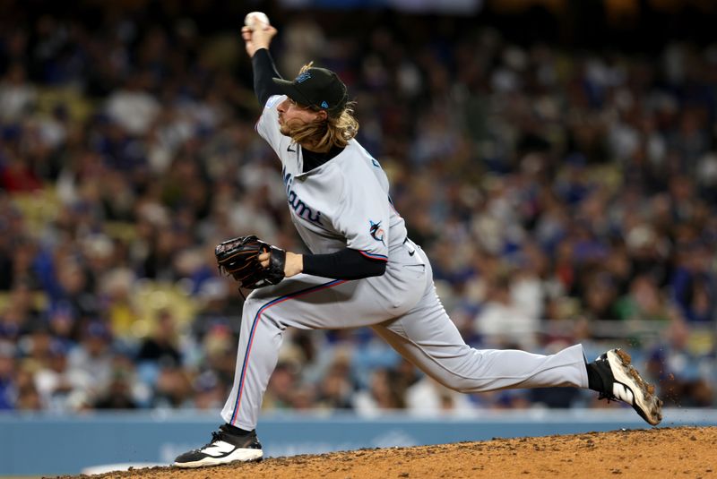 Apr 28, 2025; Los Angeles, California, USA; Miami Marlins pitcher Lake Bachar (84) throws during the fifth inning against the Los Angeles Dodgers at Dodger Stadium. Mandatory Credit: Jason Parkhurst-Imagn Images